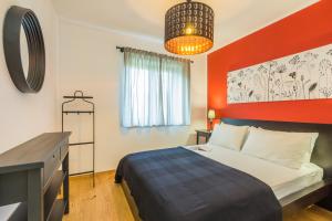 Posteľ alebo postele v izbe v ubytovaní Villa Manus - Boutique Apartments + 36 fotografií