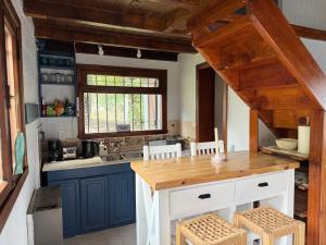 Kuchyň nebo kuchyňský kout v ubytování Naty + 11 fotografií