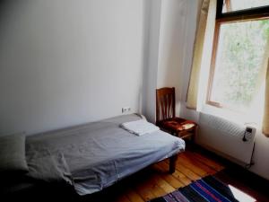 Кровать или кровати в номере Kirilova House