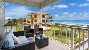 a view from the balcony of a beachfront house at Sea Haunts 1A in Santa Rosa Beach