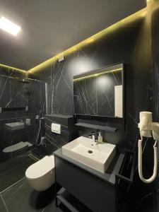 Koupelna v ubytování Apartament Koha + 37 fotografií