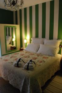 A bed or beds in a room at B&B L'Albero Di Antonia