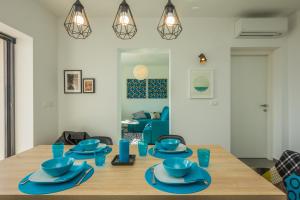 Posedenie v ubytovaní Villa Manus - Boutique Apartments