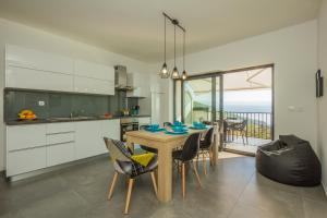Kuchyňa alebo kuchynka v ubytovaní Villa Manus - Boutique Apartments