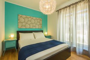 Posteľ alebo postele v izbe v ubytovaní Villa Manus - Boutique Apartments