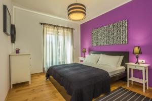 Posteľ alebo postele v izbe v ubytovaní Villa Manus - Boutique Apartments