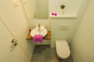 Kúpeľňa v ubytovaní Villa Manus - Boutique Apartments