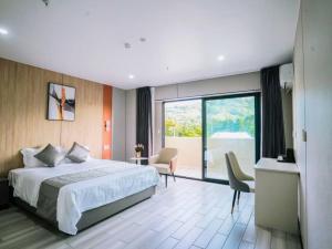 Postel nebo postele na pokoji v ubytování Taufusi Hotel