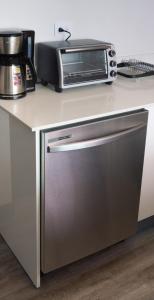 Una cocina o cocineta en Man Cave