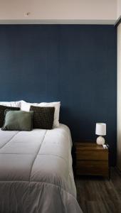 Una cama o camas en una habitación de Man Cave