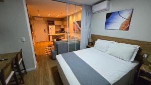 Ένα ή περισσότερα κρεβάτια σε δωμάτιο στο Encanto de Flat no Serra Class +38 φωτογραφίες