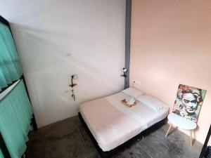A bed or beds in a room at Imagine hostel