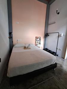 A bed or beds in a room at Imagine hostel