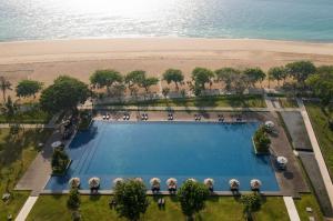 an overhead view of a swimming pool next to the beach at Bali Beach Hotel in Sanur
