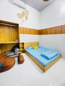 Ένα ή περισσότερα κρεβάτια σε δωμάτιο στο M91 Homestay