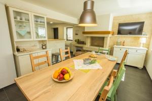Kuchyňa alebo kuchynka v ubytovaní Villa Manus - Boutique Apartments