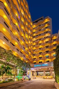 a rendering of the sultan hotel at night at Sunbeam Hotel Pattaya in Pattaya Central