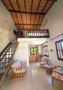 Гостиная зона в Five Fingers Holiday Bungalows