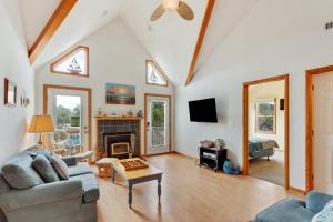 a living room with a couch and a fireplace at 1714 - Destiny in Poplar Branch