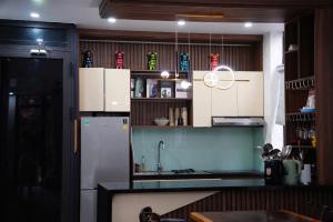 Kuchyň nebo kuchyňský kout v ubytování LyLy Villa - Venuestay + 14 fotografií