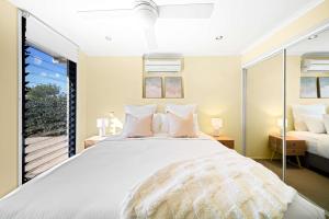 Voodi või voodid majutusasutuse Wurtulla Happy Hideway - Pool & Pet Friendly toas