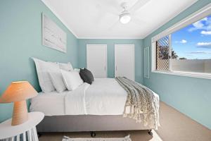 Voodi või voodid majutusasutuse Wurtulla Happy Hideway - Pool & Pet Friendly toas