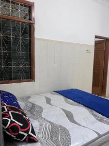 Ένα ή περισσότερα κρεβάτια σε δωμάτιο στο Hostel Bromo