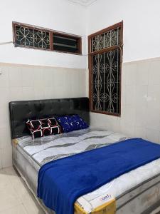Ένα ή περισσότερα κρεβάτια σε δωμάτιο στο Hostel Bromo