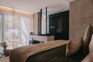 Voodi või voodid majutusasutuse Esh Hotel toas