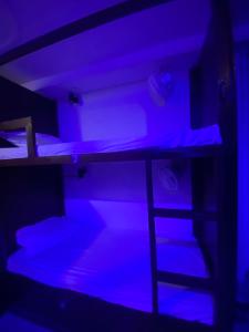 Postel nebo postele na pokoji v ubytování Cozy Inn Hostel