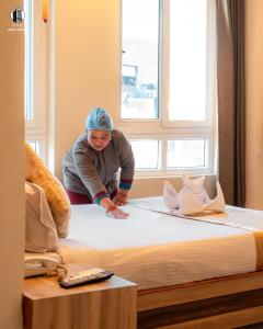 Voodi või voodid majutusasutuse Hotel Kesu Home toas