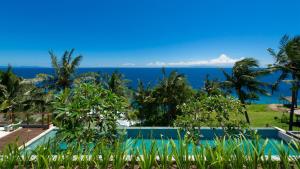 a view of the ocean from the resort at Malimbu Cliff Villa by Elite Havens in Senggigi