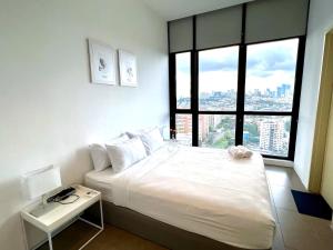 Postel nebo postele na pokoji v ubytování The EST Bangsar Kuala Lumpur