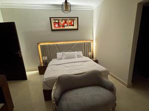 Ένα ή περισσότερα κρεβάτια σε δωμάτιο στο التجمع الخامس