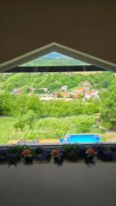 a window with a view of a parking lot at Top Hill in Zagreb