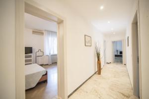 Posteľ alebo postele v izbe v ubytovaní Hotel Colombo