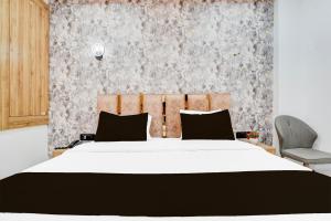 Collection O Ram Mandir Ayodhya Formerly Hotel Aarambh客房内的一张或多张床位
