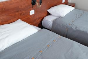 Postel nebo postele na pokoji v ubytování Hotel Solumbra