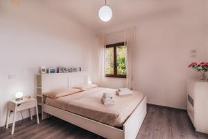 A bed or beds in a room at Jolandahome