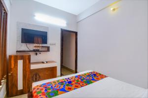 Postel nebo postele na pokoji v ubytování FabHotel New Dream Palace - Near acropilose mall and ruby hospital