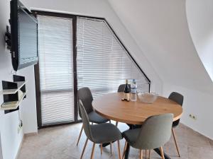 Μια τηλεόραση ή/και κέντρο ψυχαγωγίας στο MAGNOLIA Apartments
