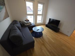 Et opholdsområde på Innsbruck Downtown Heaven Apartment + 3 billeder