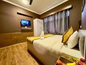 TV o dispositivi per l'intrattenimento presso Hotel Jafson Accommodates