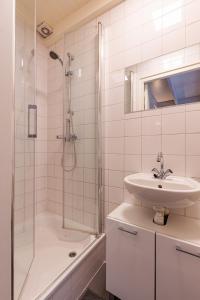Koupelna v ubytování Vrijvakantiehuis Kaai 61a, de Appelpit + 19 fotografií