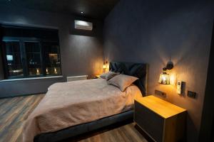 a bedroom with a large bed and a window at Luxury Beachfront Villa with Indoor Pool & BBQ in Baku +50 photos