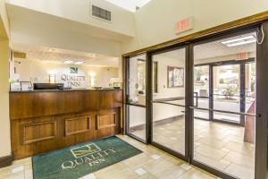 a lobby of a dental office with the front door open at Quality Inn Stone Mountain in Stone Mountain