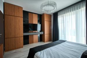 Ένα ή περισσότερα κρεβάτια σε δωμάτιο στο Bach Apartments 2