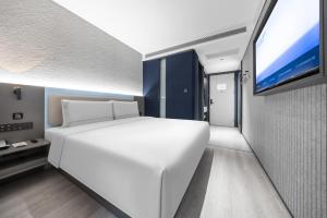 Postel nebo postele na pokoji v ubytování Atour Light Hotel Beijing West Station North Square
