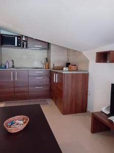 Kuchyň nebo kuchyňský kout v ubytování Belvedere Holiday Club Apartment 503