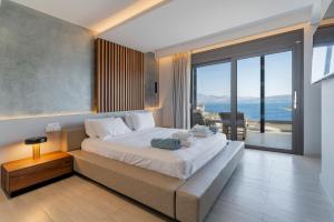 Ένα ή περισσότερα κρεβάτια σε δωμάτιο στο Villa Marianna +44 φωτογραφίες